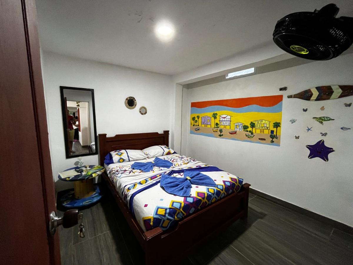 Acuarios Hostal Playa Ladrilleros Ngoại thất bức ảnh